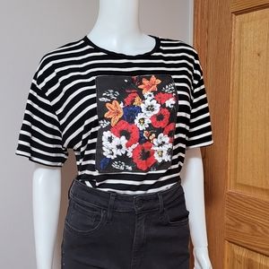 Zara top size L. Black and white stripes flower square in the middle.
